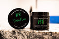 Sensual Love whipped body butter in a Neeno Body branded black jar on a marble countertop