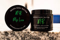 My Love whipped cream body butter in a Neeno Body black jar on a marble countertop