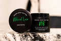 Natural Love body butter by Neeno,  in an elegant black jar with a matching black lid.